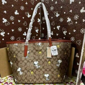 NWT Coach X Peanuts City Tote In Signature Canvas With Snoopy Woodstock